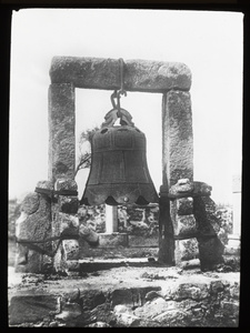 A temple bell hanging outdoors