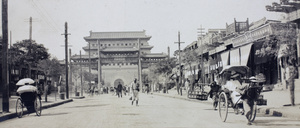 The arrow tower of Chenyangmen, with street and pailou