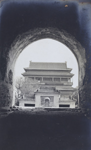 The Drum Tower, viewed through the Bell Tower archway, Peking