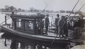 Passengers disembarking from a tour/ferry boat, Peking