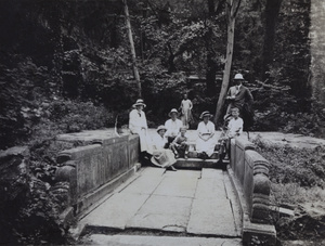 A group on a bridge, near Peking