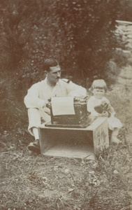Audrey Gregg and her father, with typewriter