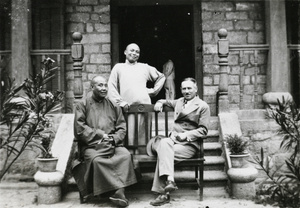 E.E. Wilkinson with two Chinese men
